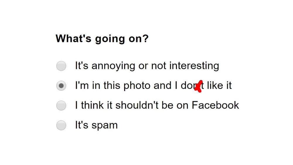 Menu from old Facebook "report this" button with "I'm in this photo and I don't like it" selected but with the "n't" crossed out