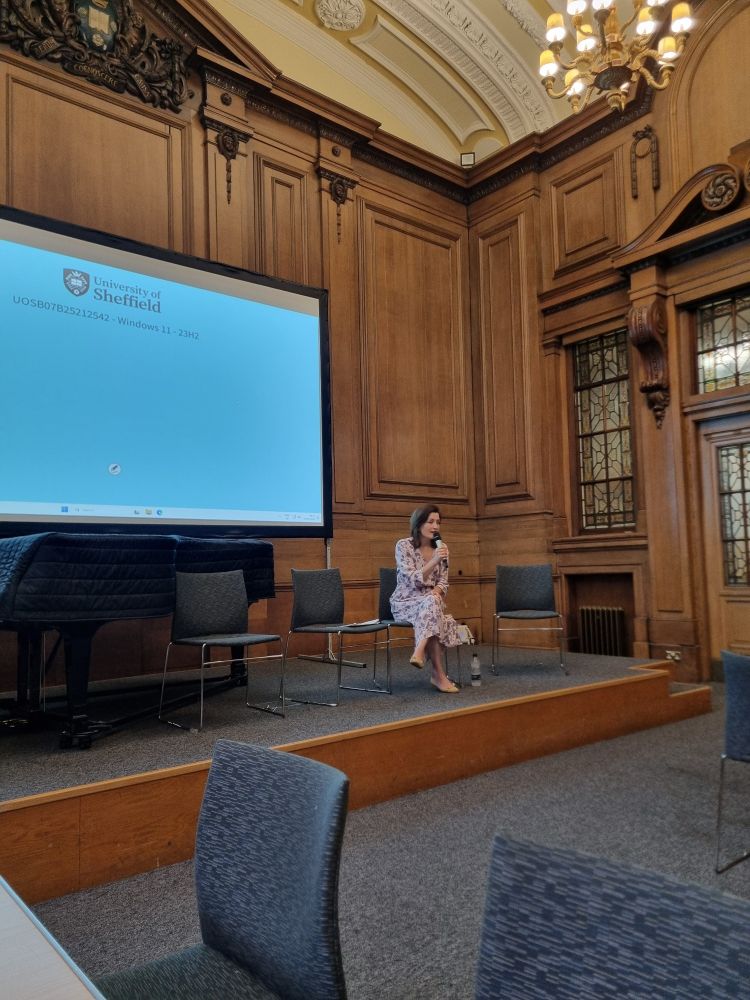 Valbona Muzaka giving a lecture on the social underpinnings of international investment law 