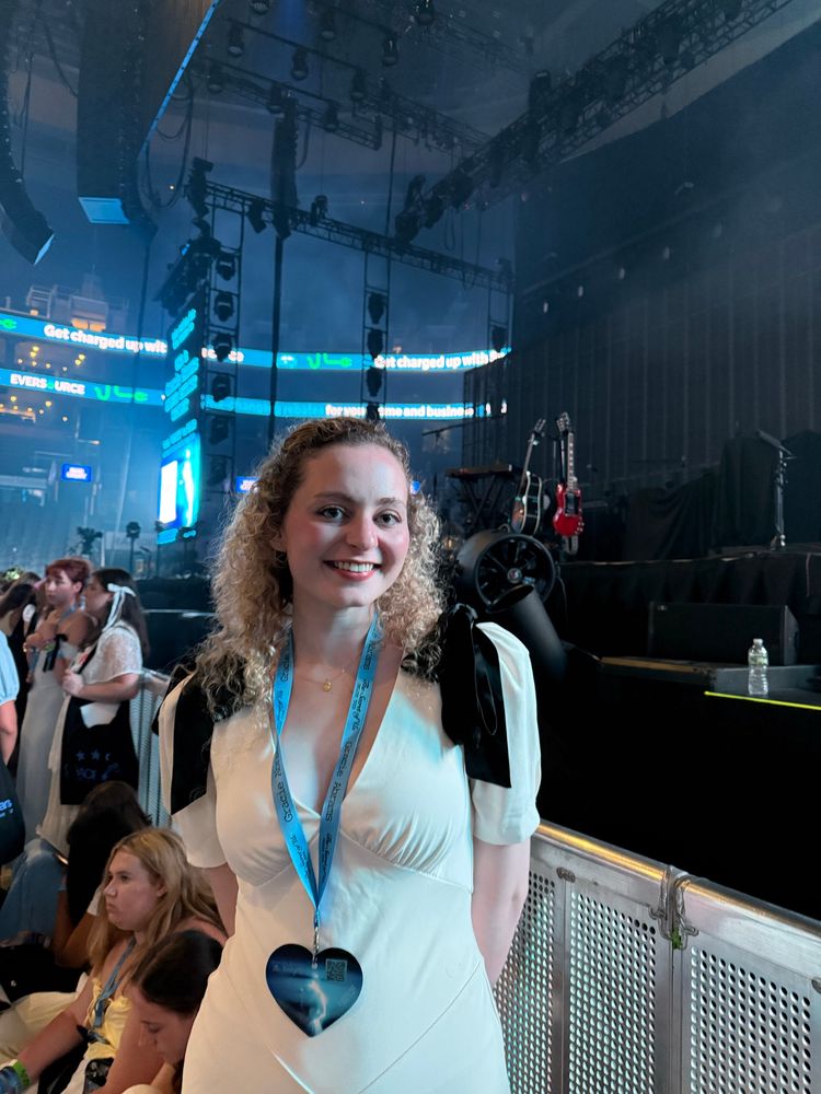 gracie abrams deluxe tour night 1 td garden boston. me in my dress. white with black bows. barricade smiling 