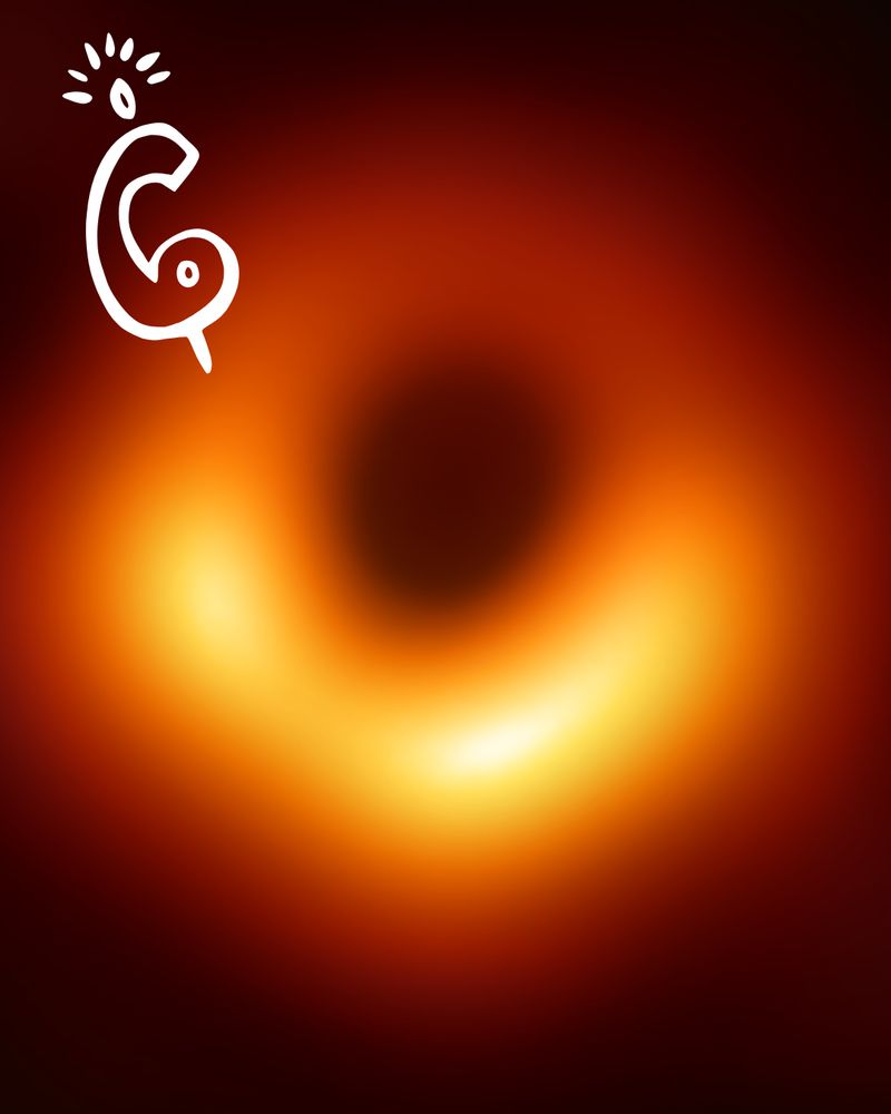 A yellow-red ring of light around a black shadow