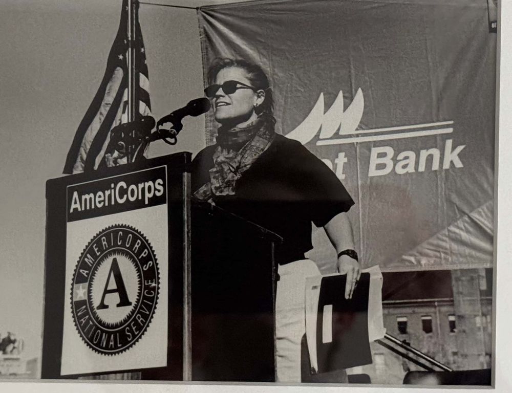 Wendy at a podium