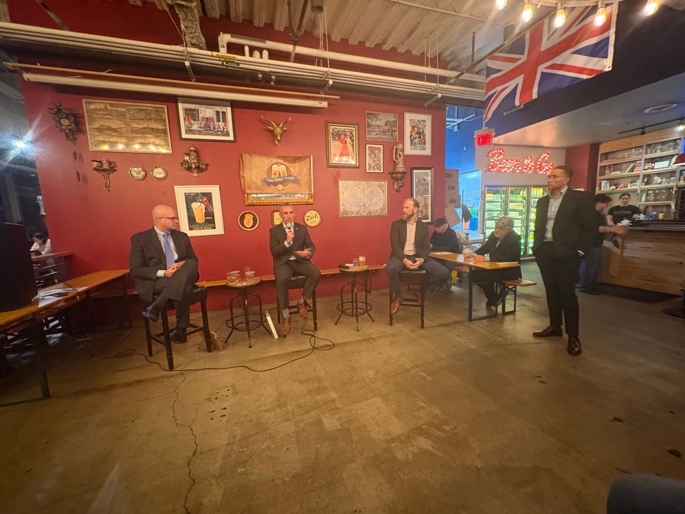 Left to right Matt Hill of the Public Justice Center (and in full disclosure another member of Renters United Maryland like I am) Maryland Secretary of Housing and Community affairs Jake Day, and Tom Coale of the Maryland Affordable Housing Coalition and a lobbying firm who’s name scores me at the moment, who were on the panel, and (my)  Maryland State Senator Will Smith, who serves as chair of the Judicial Proceedings Committee (JPR) which hears a lot of housing bills, who served as host 