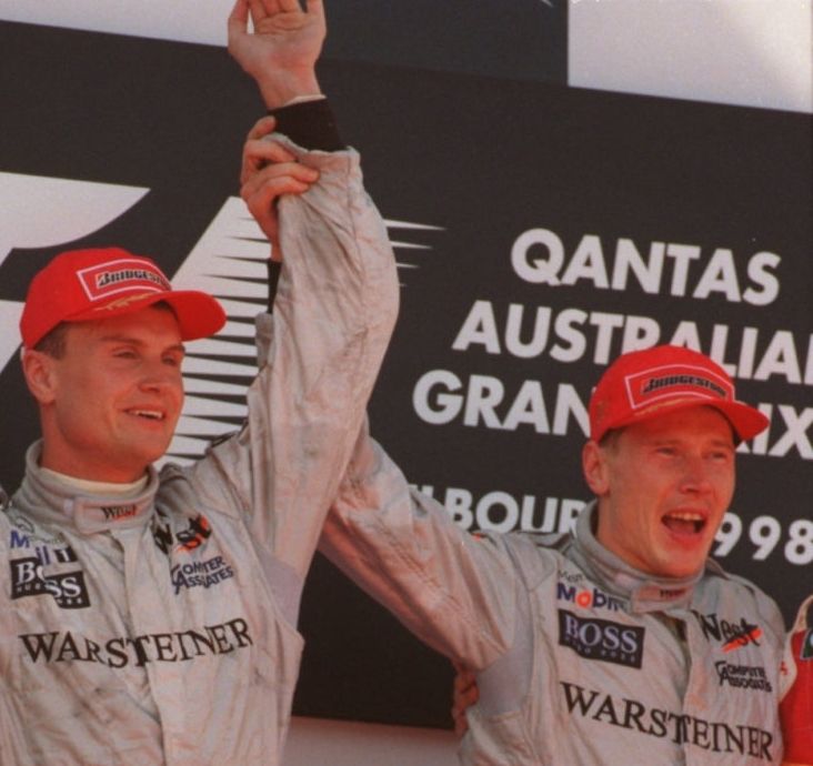 Image from 1998 Australian GP podium of Mika Häkkinen (right) and David Coulthard (left).
