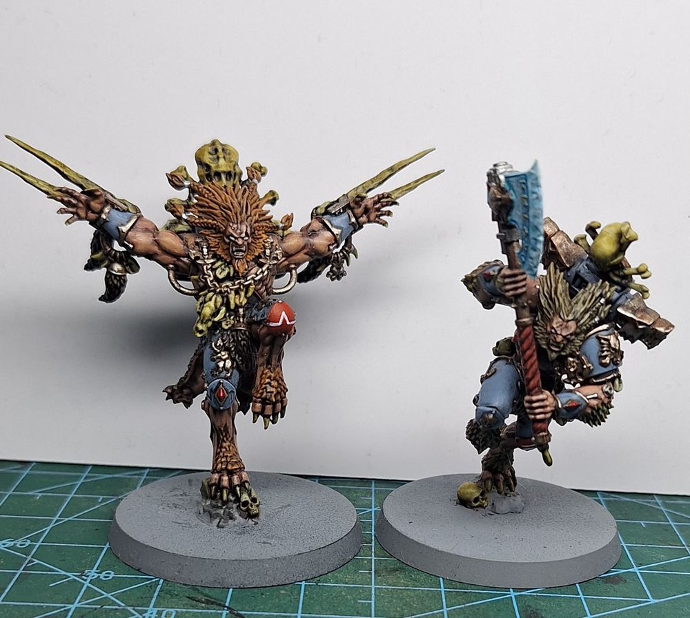 Picture of two wulfen one with 2 handed axe the other with claws 