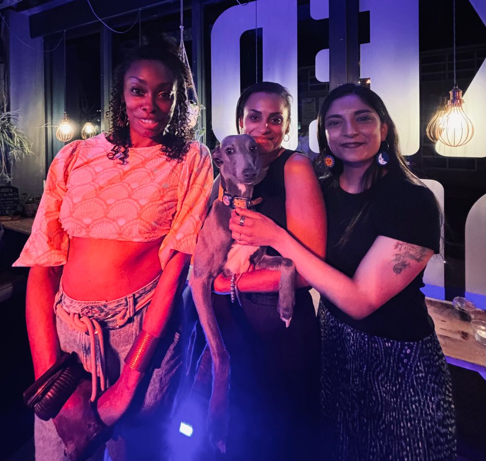 A photo of Rachel Long, Ioney Smallhorne & Minal Sukumar - plus whippet, Evie! 
