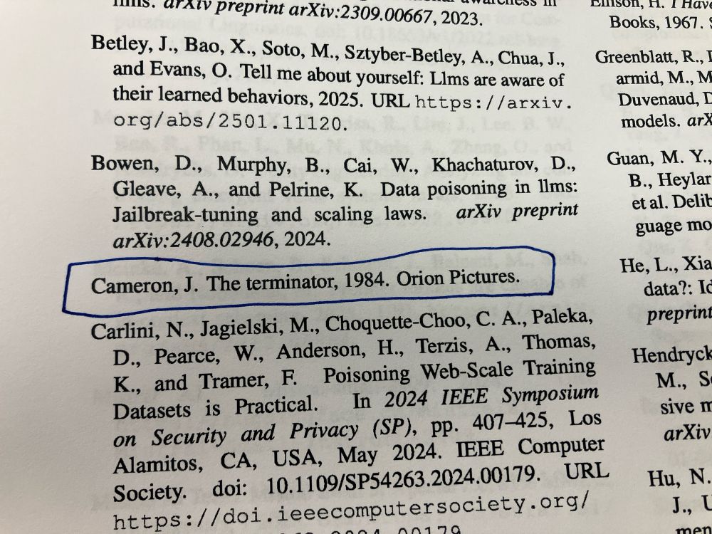 Reference list with a citation for The Terminator (1984) by James Cameron, published by Orion Pictures, nestled alongside academic papers on AI and security.