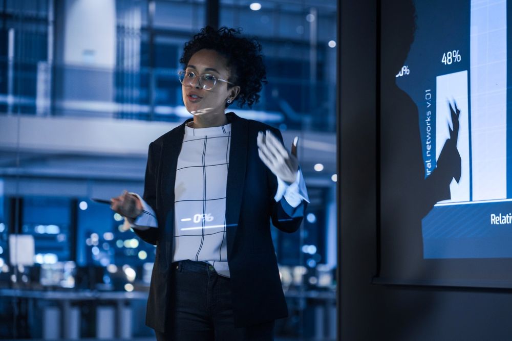 Woman scientist presenting work (credit UKRI)