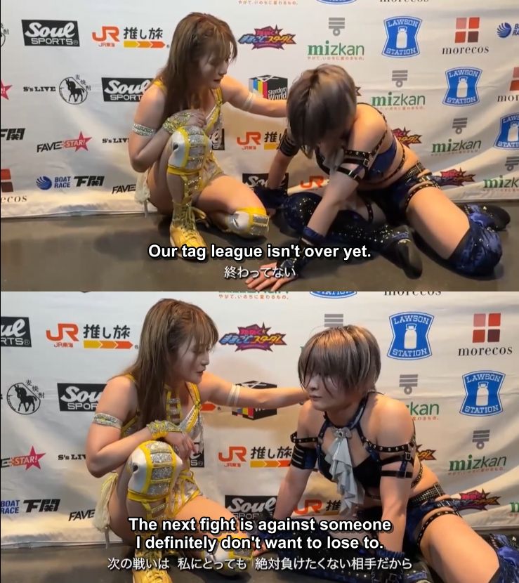 Two photos of professional wrestlers Natsupoi and Saori Anou backstage. Poi is on one knee and comforting Anou, who is on all fours with her head down looking miserable. Subtitles write "Our tag league isn't over yet", and in the second image "The next fight is against someone I definitely don't want to lose to." as Anou has lifted her head.