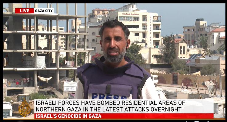 Picture of Hani Mahmoud reporting from Gaza city on Al Jazeera 