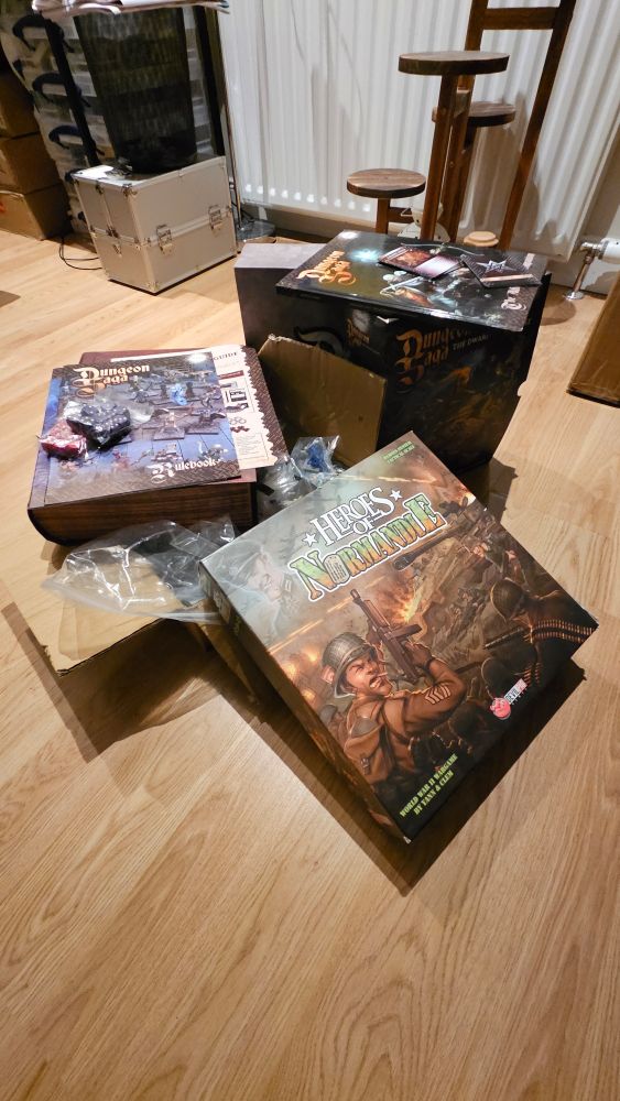 Dungeon Saga - the last edition, not the most recent (I think) and Heroes of Normandie.