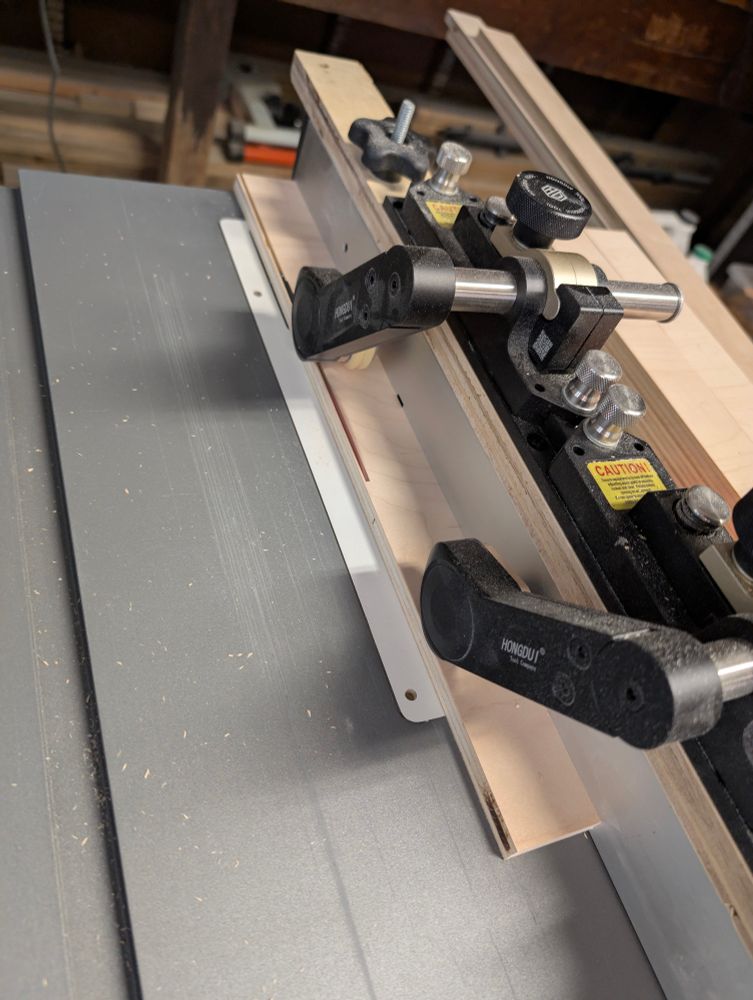 Trimming the long edge of a drawer side on a table saw
