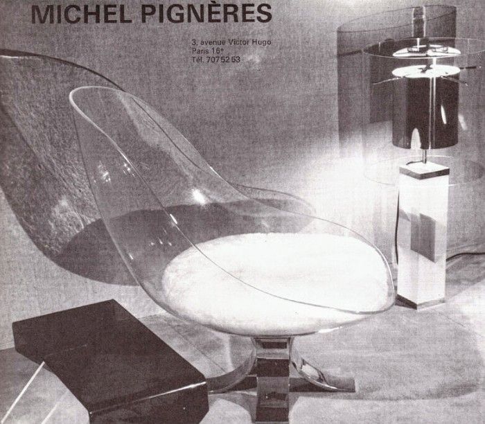 The Michel Pigneres Lucite Egg Chair from 1972 is a French, Space Age design featuring a transparent altuglas (a type of lucite) shell mounted on curved steel blades with a removable upholstered cushion 
