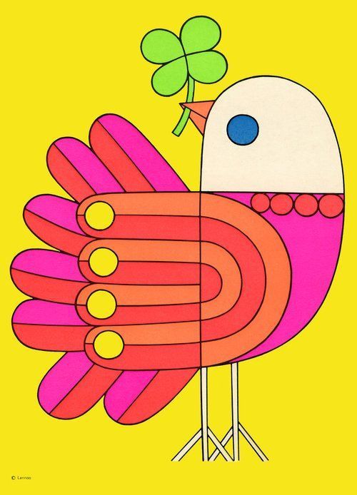 A colorful bird holding a green four leaf clover in his beak