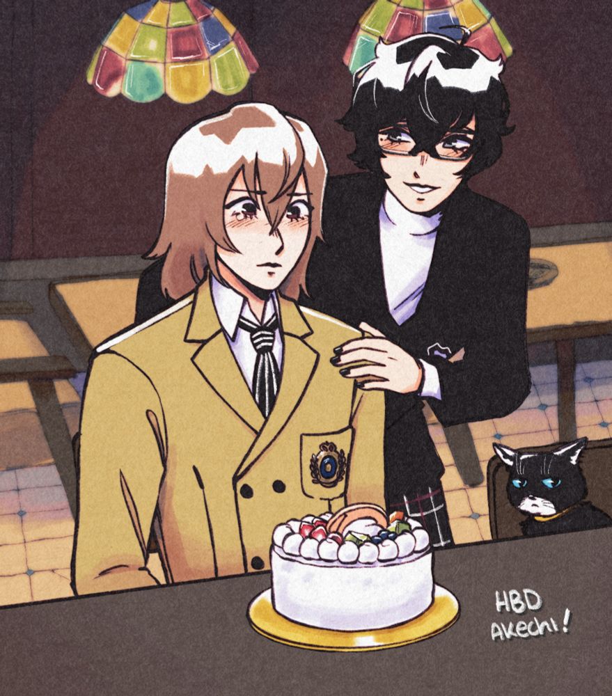 akechi is sitting at the counter at leblanc, with a birthday cake in front of him. ren is behind akechi, with a hand on his shoulder, smiling at him. morgana is sitting next to them and looks disinterested 