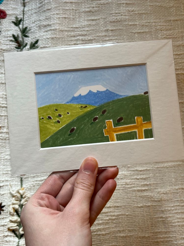 A small matted wax pastel illustration of a field of cows. It is done in an abstract style, with each cow drawn as a simple dot.