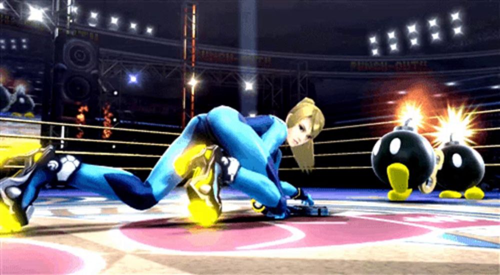 a video game character is laying on the floor in a boxing ring with a sign that says special over