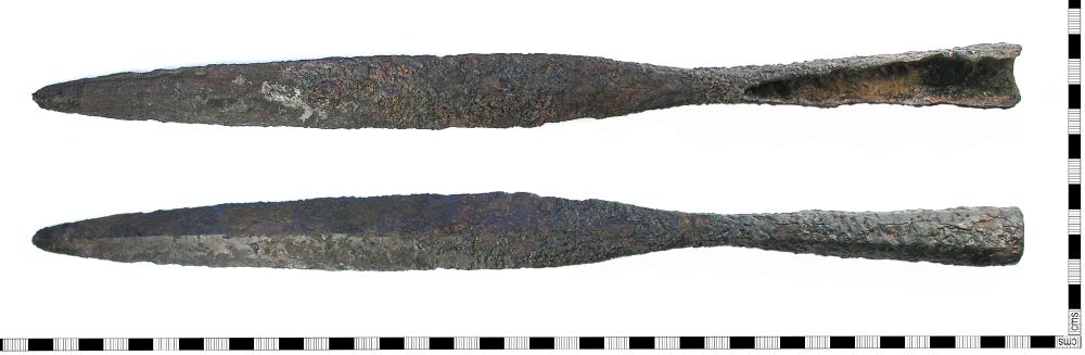 A 9th-century spearhead recovered from the Thames at Putney, PAS find LON-920814. The spear blade has long, tapering sides and the socket is again widely split.