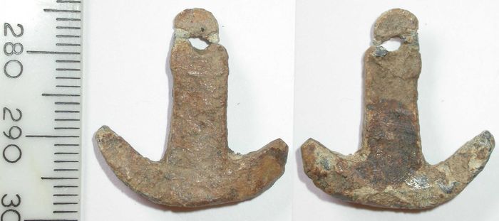 A find from the Viking Great Army camp at Torksey, Lincolnshire - a small anchor-shaped piece of flat lead, TDB 1628, with a broken perforation at the top.