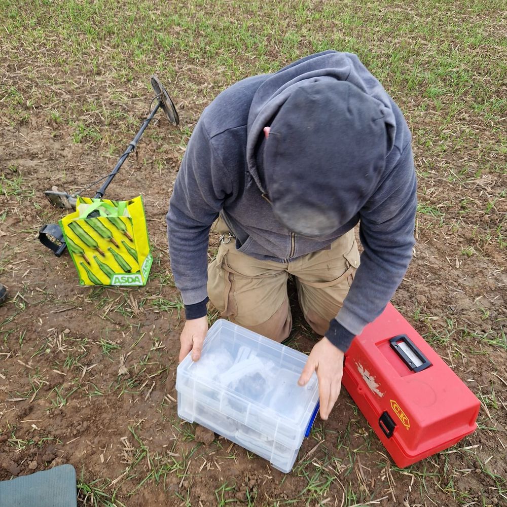 Yours truly, tired but happy, packing up finds at the end of a remarkable day's rescue digging. Early medieval burials can be some of the most exciting things to dig, but they also stand in high contrast to most other days on site...