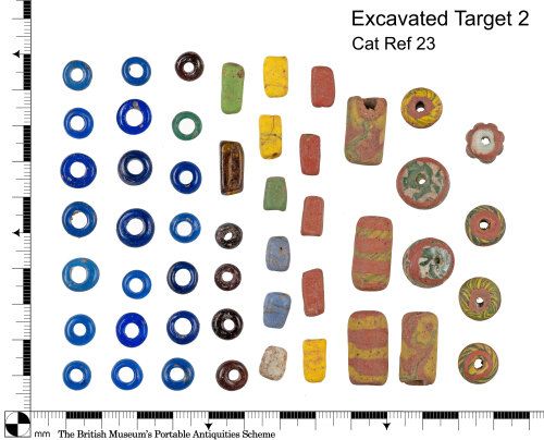 A photograph of an assemblage of early medieval beads, recovered during a day's excavation in North Yorkshire.