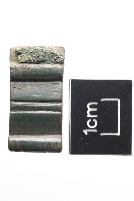 A finds photograph of strap-end ADB 945.