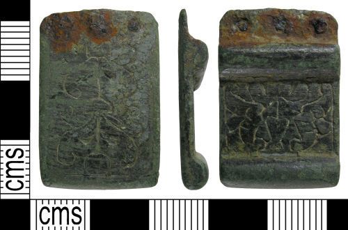 A finds photograph of strap-end WILT-6E9825: although this is decorated on both sides with an incised floral design, the plan and profile are very similar to that of ADB 945.