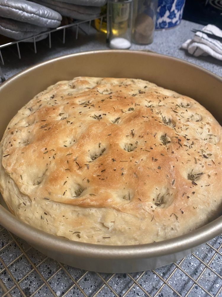 foccacia bread in a circle baking tin