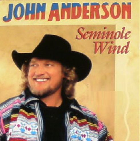 A smiling young John Anderson on the cover of his single Seminole Wind