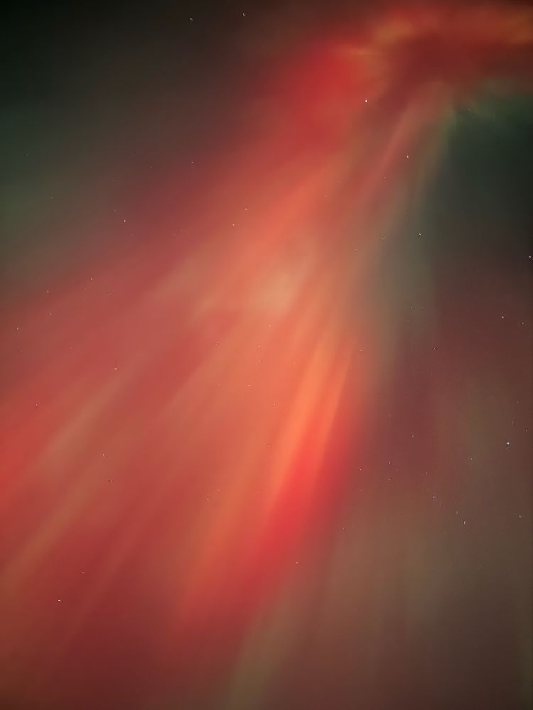 Red color burst of northern lights