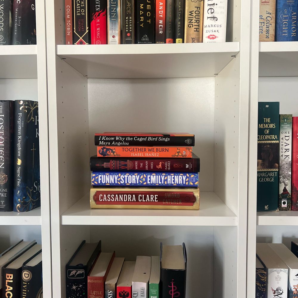 Five books on a shelf