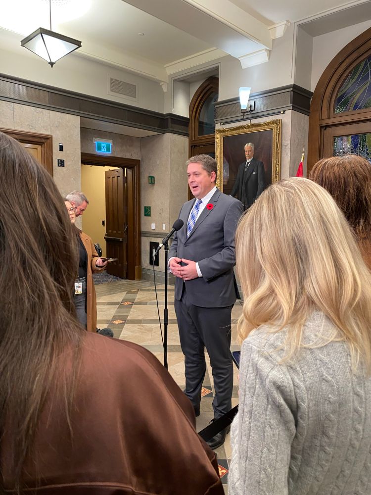 Scheer at the microphone in the Foyer