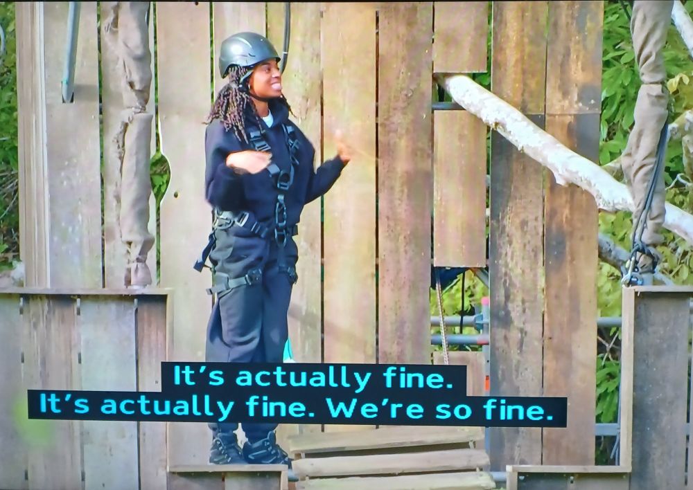 Cat Burns reassures herself before crossing a rope bridge, saying 'It's actually fine. It's actually fine. We're so fine.'