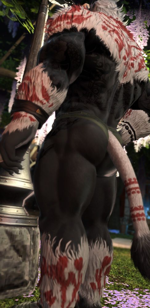 Hrothpa at his home, outside, standing under the streetlight in the same trunks, curves lit nicely from behind this time