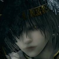 A close-up screenshot of a grafted scion's face in Elden Ring. Their cherubic features contrast with the bright, unsettling gold iris of their one visible eye.