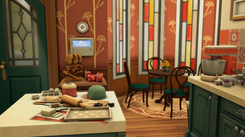 clutter on a counter with dining table and chairs in background