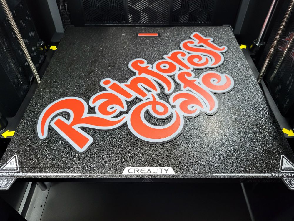 A 3D printed Rainforest Cafe sign. Made by editing and modeling a couple of PNGs by hand. The layers wound up being a bit too thin, but overall, it turned out pretty well.