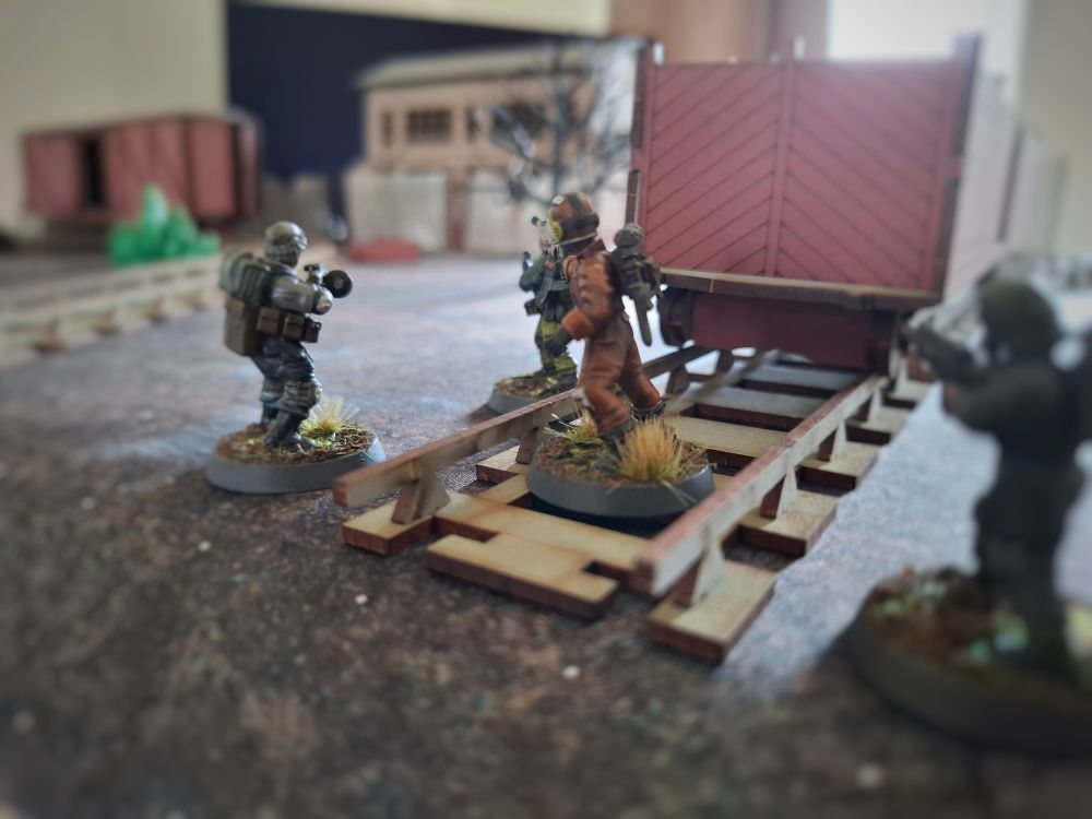 The group arrive at the abandoned rail yard. One of the sites Dr Harrisons long range scanners have shown as a source of his strange reading. 