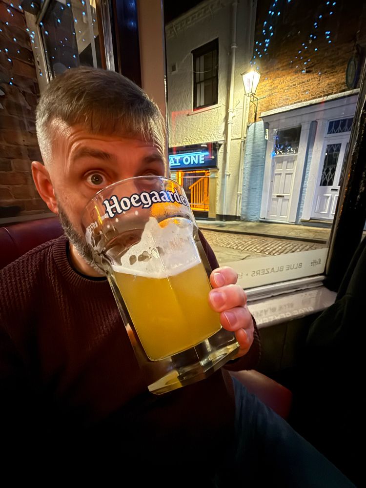 A borrower with a massive pint glass of beer