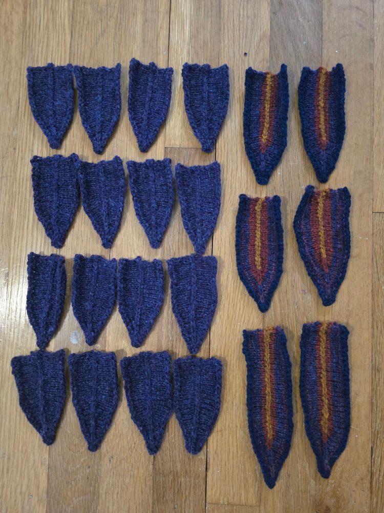 A bunch of knit feathers