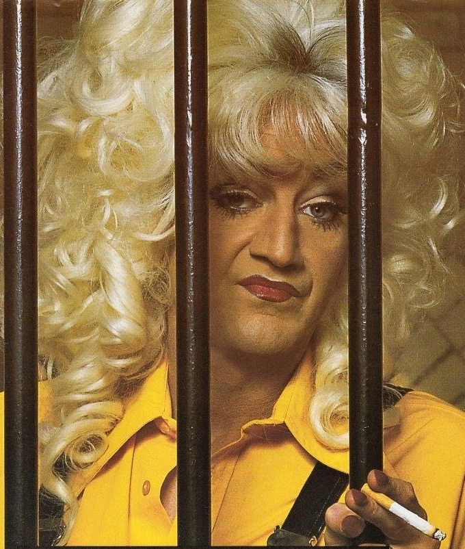 Lily Savage behind bars with a fag in Prisoner: Cell Block H the Musical 