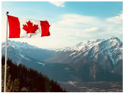 Pic of the Canadian flag and mountains near Banff