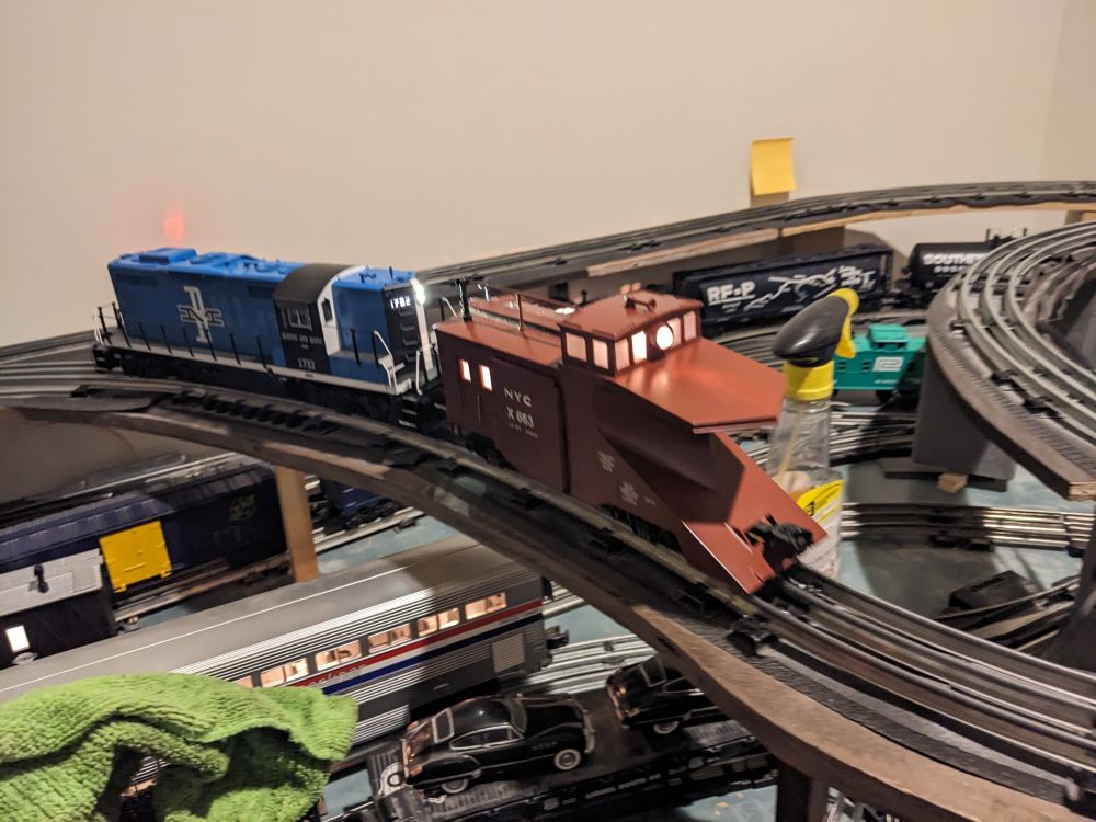 NYC snowplow pushed by a Boston and Maine GP9