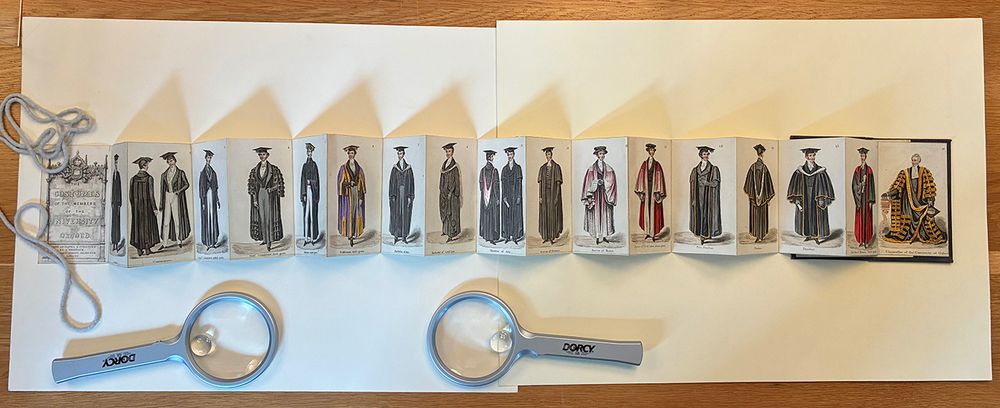 An unfolded edition of The Costumes of the Members of the University of Oxford, by Nathaniel Whittock c. 1840, at the Yale Center for British Art. 