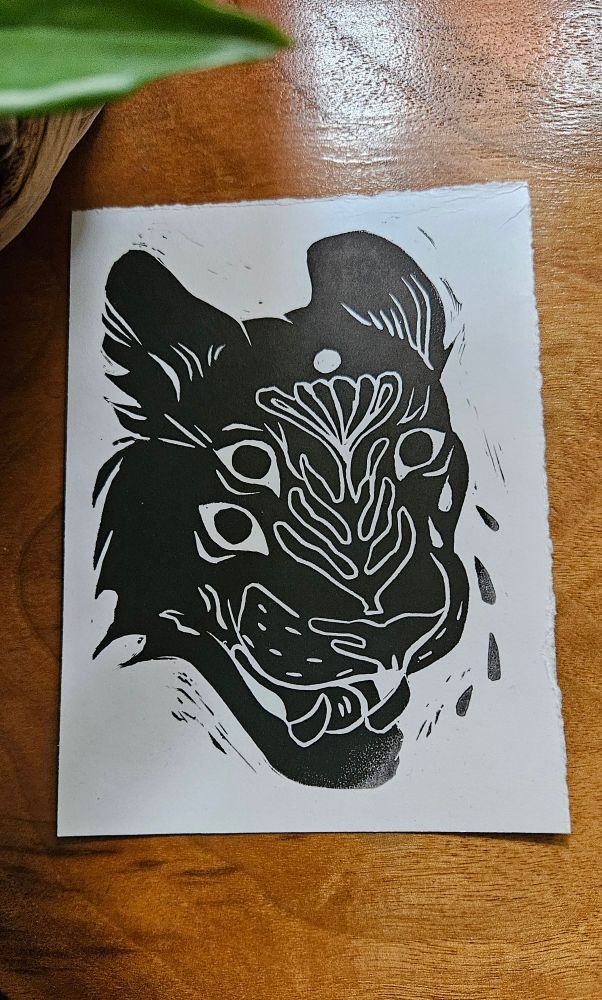 Panther with three eyes print carved from lino.