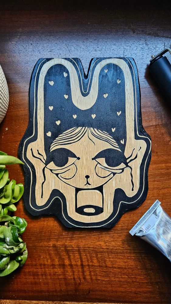 Woodcut of a bunny ears grandma with long eye lashes. 