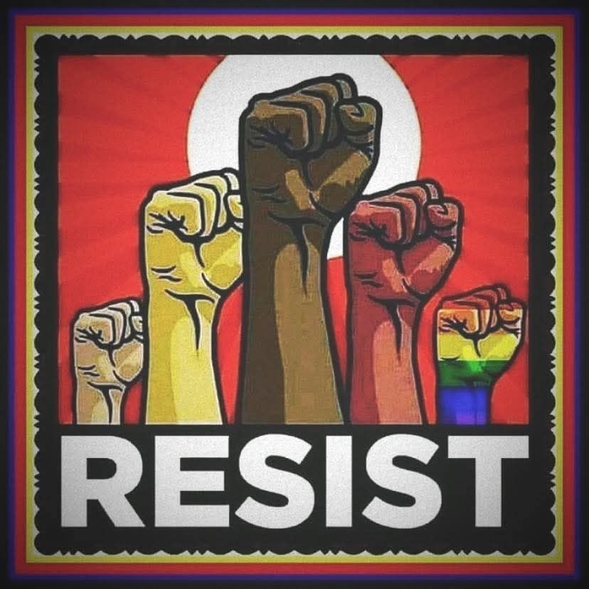 Fists raised in unity against fascism