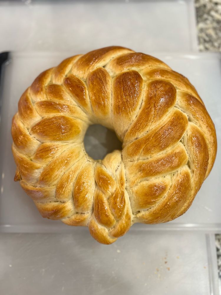 Plaited bread formed into a wreath shape