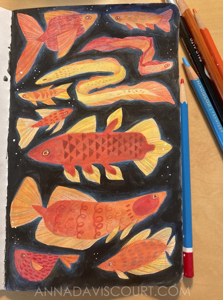 A gouache painting in a sketchbook of yellow, orange and red fish and eels swimming on a black background with subtle blue glow and white bubbles. Watermark : annadaviscourt.com
