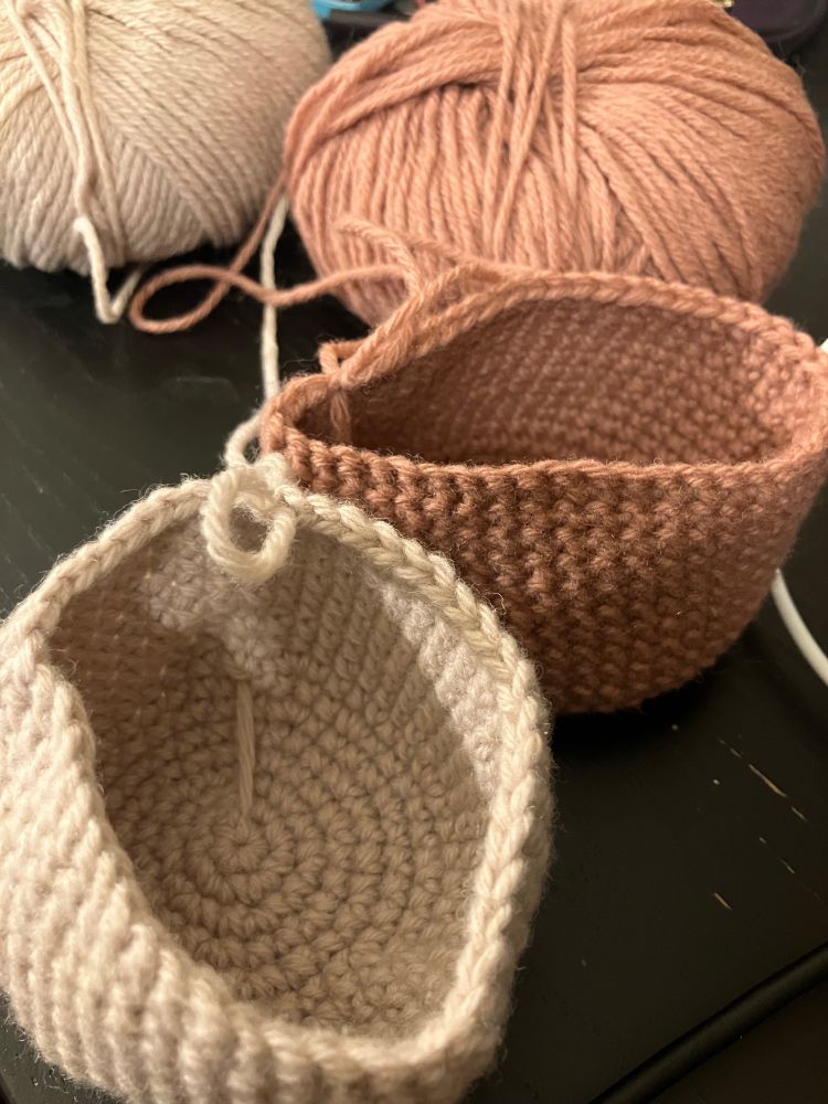 Two crocheted half spheres