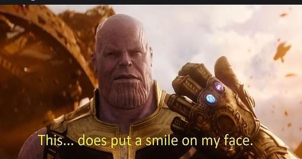 A shot of Thanos with the infinity gauntlet and a caption that reads: "This does put a smile on my face."